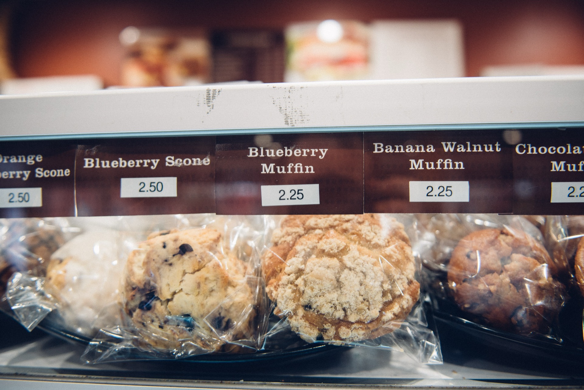 Fresh-baked scones and muffins in the pastry case