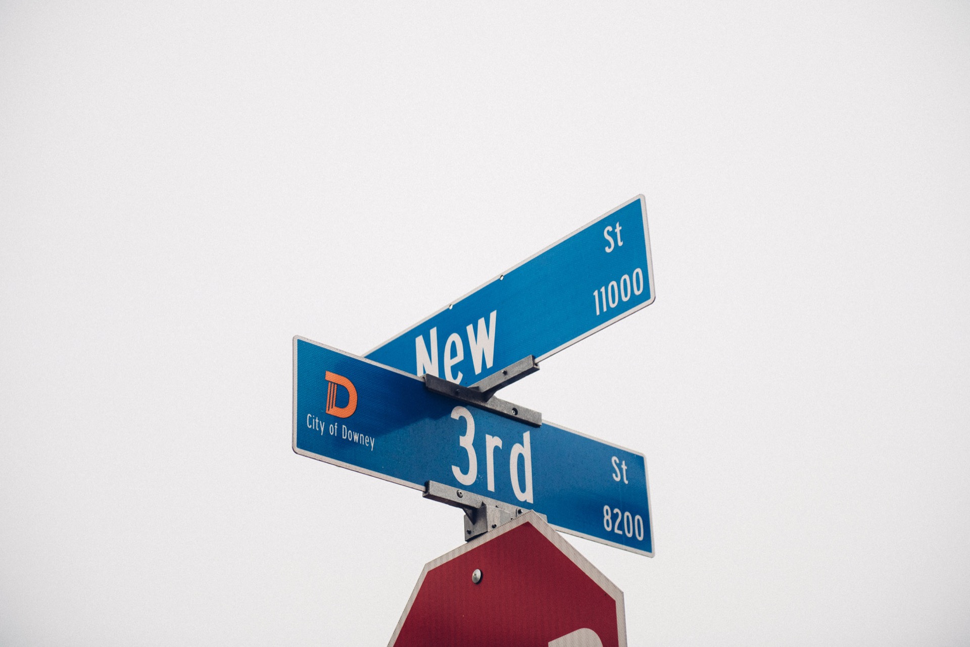 City of Downey street sign at 3rd Street and New Street